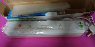 Vacuum Sealer (comes with vacuum bags)