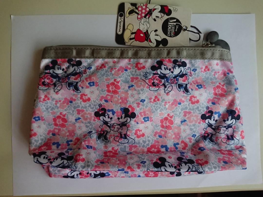 LeSportsac Cosmetic Clutch in Disney Minnie Spring Fling (Category: Purses & Pouches) located in Singapore. Submitted by ekl1784 (Listing ID 259524884, Image 2). Description: LeSportsac, brand new and authentic Disney Minnie Mouse 2016 Cosmetic Clutch 7105 Spring Fling P929 Approx 5.75 X 8.5 X 2.5 inches Zipped main closure Front pocket with zipped closure.
