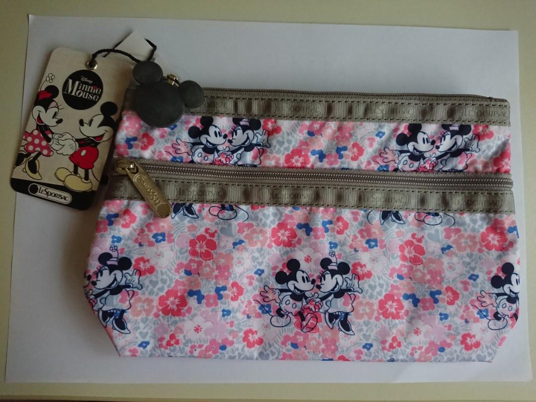 LeSportsac Cosmetic Clutch in Disney Minnie Spring Fling (Category: Purses & Pouches) located in Singapore. Submitted by ekl1784 (Listing ID 259524884, Image 1). Description: LeSportsac, brand new and authentic Disney Minnie Mouse 2016 Cosmetic Clutch 7105 Spring Fling P929 Approx 5.75 X 8.5 X 2.5 inches Zipped main closure Front pocket with zipped closure.
