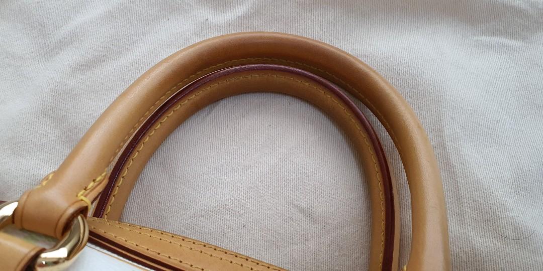 Authentic Louis Vuitton LV Murakami Priscilla Multicolore Bag (Category: Purses & Pouches) located in Singapore. Submitted by joyfleur (Listing ID 66994755, Image 6). Description: Authentic Louis Vuitton Priscilla bag 10.5" L x 7.5" W x 8.25" H In good condition Comes with LV dustbag and carrier Nett price Price is firm. Questions about reducing the price and trade-ins will not be answered. Key clochet is not included as this bag originally doesn