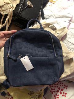 Mini leather bagpack