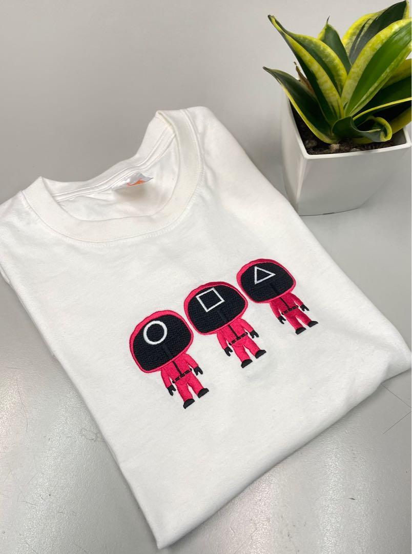 Embroidery Squid game T-shirt! (Category: Tshirts & Polo Shirts) located in Singapore. Submitted by sophiachong800 (Listing ID 1120551424, Image 1). Description: Brand new cotton T-shirt with embroidery squid game doll⏺⏹🔼 Size available from XS-4XL.