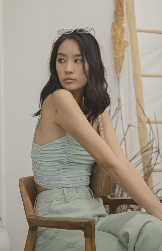 YHF Darling Ruched Top in Honeydew Green (Category: Sleeveless) located in Singapore. Submitted by delilahbard (Listing ID 1100402232, Image 2). Description: • tagged size S, mint condition • pm for more info # yhf young hungry free younghungryfree scruched ruched crop top .