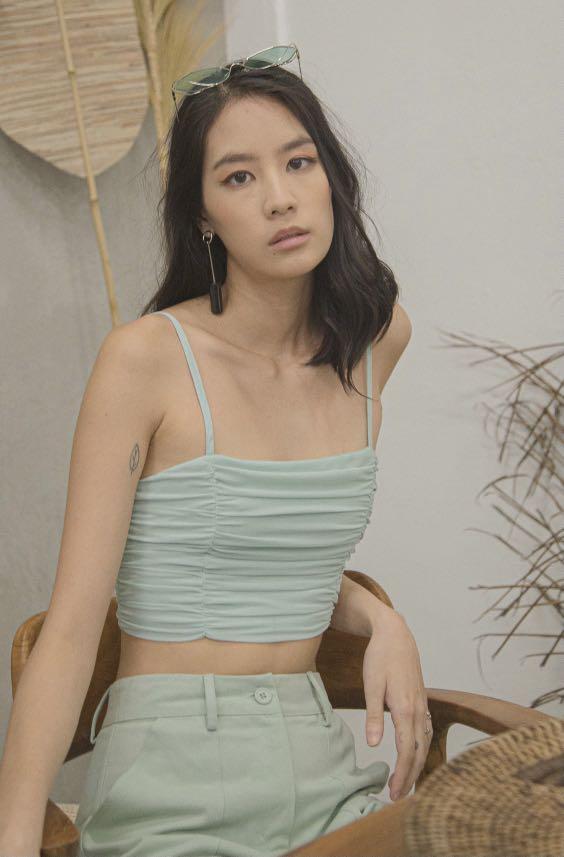YHF Darling Ruched Top in Honeydew Green (Category: Sleeveless) located in Singapore. Submitted by delilahbard (Listing ID 1100402232, Image 1). Description: • tagged size S, mint condition • pm for more info # yhf young hungry free younghungryfree scruched ruched crop top .