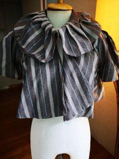 Cape style outer wear with lining