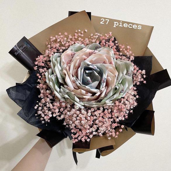 Camellia money bouquet/ Birthday bouquet/ Valentine’s Day bouquet / Mother’s Day bouquet (Category: Flowers & Bouquets) located in Singapore. Submitted by babyblomst (Listing ID 1145913641, Image 2). Description: Customisable Money Bouquet -Charges depends on the number of pieces 🌷Flower colour: Pink, blue, purple, red, yellow , orange, white 🌷Wrapper: Pink, purple, blue, yellow, orange, red, white, Black and gold 🌷Add on (optional): +$5 Fairy