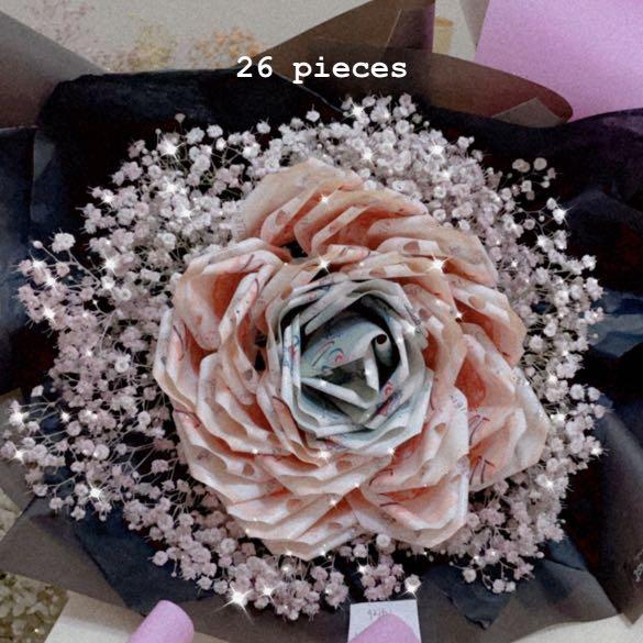 Camellia money bouquet/ Birthday bouquet/ Valentine’s Day bouquet / Mother’s Day bouquet (Category: Flowers & Bouquets) located in Singapore. Submitted by babyblomst (Listing ID 1145913641, Image 5). Description: Customisable Money Bouquet -Charges depends on the number of pieces 🌷Flower colour: Pink, blue, purple, red, yellow , orange, white 🌷Wrapper: Pink, purple, blue, yellow, orange, red, white, Black and gold 🌷Add on (optional): +$5 Fairy