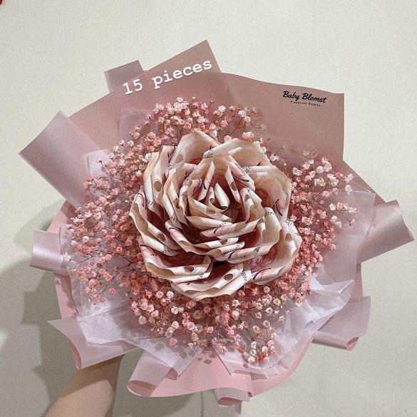 Camellia money bouquet/ Birthday bouquet/ Valentine’s Day bouquet / Mother’s Day bouquet (Category: Flowers & Bouquets) located in Singapore. Submitted by babyblomst (Listing ID 1145913641, Image 8). Description: Customisable Money Bouquet -Charges depends on the number of pieces 🌷Flower colour: Pink, blue, purple, red, yellow , orange, white 🌷Wrapper: Pink, purple, blue, yellow, orange, red, white, Black and gold 🌷Add on (optional): +$5 Fairy