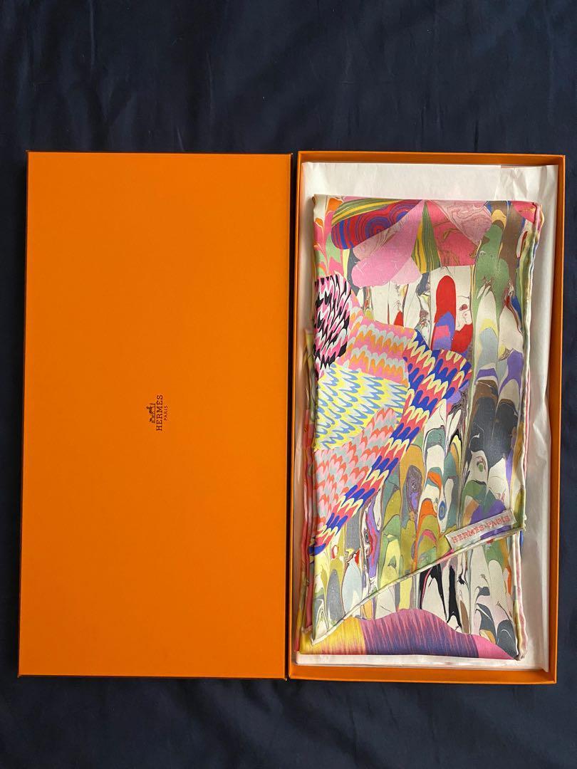 Hermes marble silk muffler (Category: Scarves) located in Singapore. Submitted by cinco.sg (Listing ID 1179048198, Image 3). Description: RARE collectible item! BNIB with copy receipt Muffler in silk (100% silk) This psychedelic marble print, bursting with vivid colors, is the product of a rare expertise, hand-crafted in a workshop in Kyoto. A paste dipped in different colored pigments is skillfully blended together and cut up to form patterns th