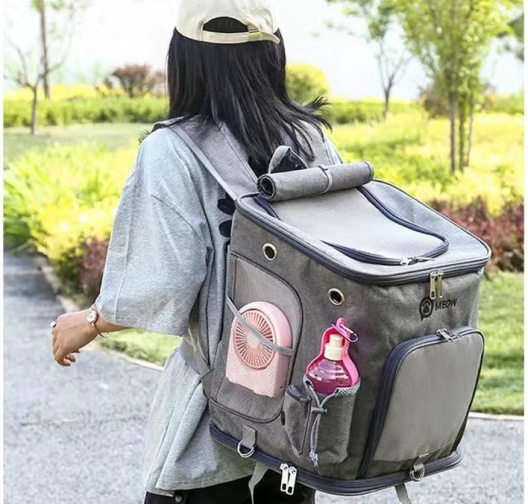 Large pet carrier cat bag (Category: Homes & Other Pet Accessories) located in Singapore. Submitted by live_with_pet (Listing ID 1175137043, Image 1). Description: Large carrier for cats and dogs dimension: 43x40x31cm -Great for large cats that is heavy and big size.