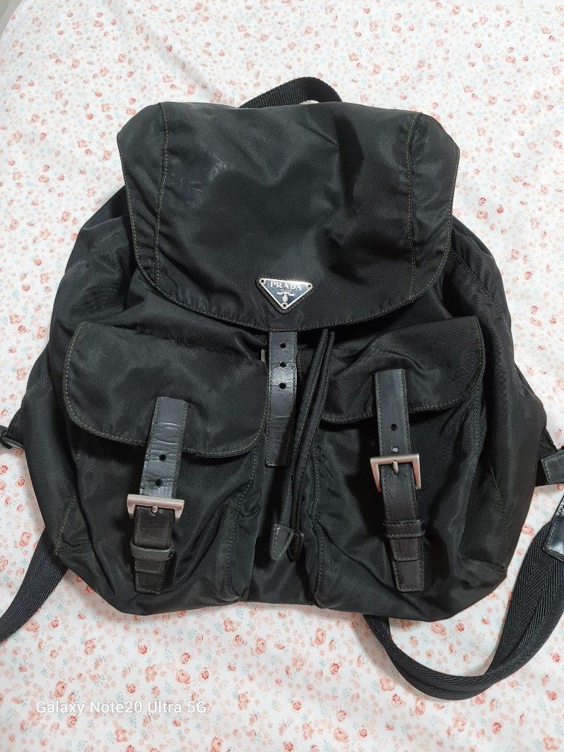 Heavily used Vintage Prada backpack (Category: Bags & Wallets) located in Singapore. Submitted by szane1 (Listing ID 1264918285, Image 1). Description: Authentic Vintage Prada Backpack, comes with bag alone. Take note the condition of this vintage piece- pics reflected as best as I could to show true condition..
