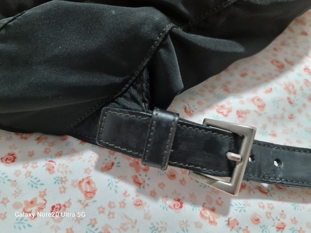 Heavily used Vintage Prada backpack (Category: Bags & Wallets) located in Singapore. Submitted by szane1 (Listing ID 1264918285, Image 6). Description: Authentic Vintage Prada Backpack, comes with bag alone. Take note the condition of this vintage piece- pics reflected as best as I could to show true condition..