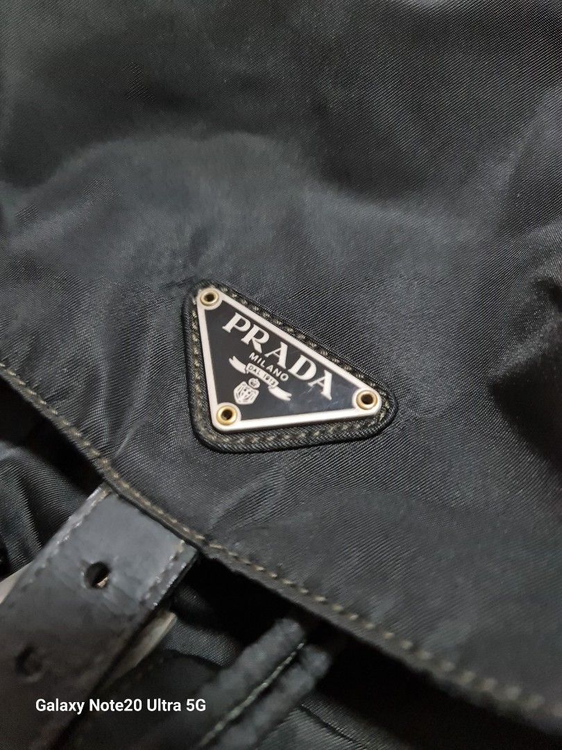 Heavily used Vintage Prada backpack (Category: Bags & Wallets) located in Singapore. Submitted by szane1 (Listing ID 1264918285, Image 3). Description: Authentic Vintage Prada Backpack, comes with bag alone. Take note the condition of this vintage piece- pics reflected as best as I could to show true condition..