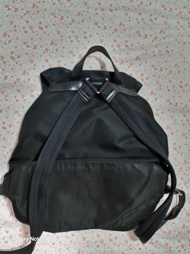 Heavily used Vintage Prada backpack (Category: Bags & Wallets) located in Singapore. Submitted by szane1 (Listing ID 1264918285, Image 4). Description: Authentic Vintage Prada Backpack, comes with bag alone. Take note the condition of this vintage piece- pics reflected as best as I could to show true condition..