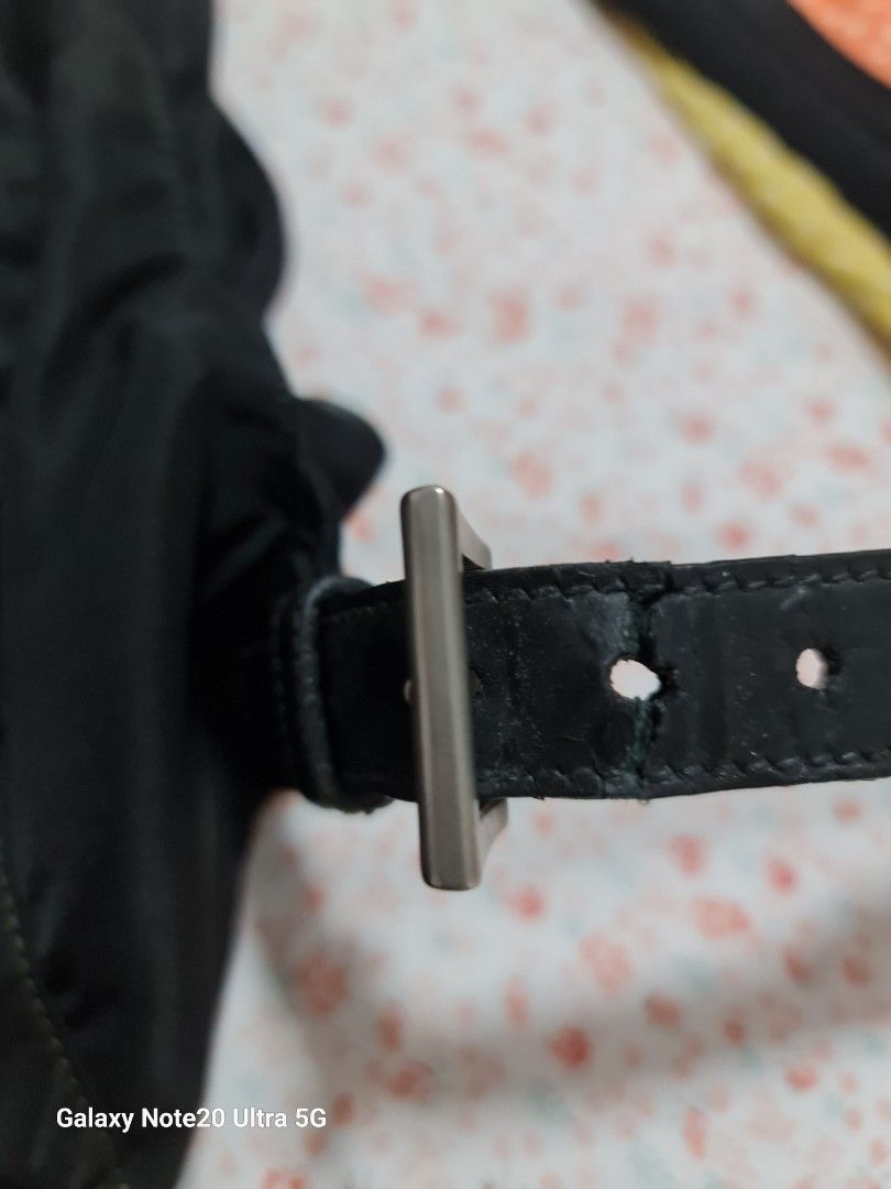 Heavily used Vintage Prada backpack (Category: Bags & Wallets) located in Singapore. Submitted by szane1 (Listing ID 1264918285, Image 7). Description: Authentic Vintage Prada Backpack, comes with bag alone. Take note the condition of this vintage piece- pics reflected as best as I could to show true condition..