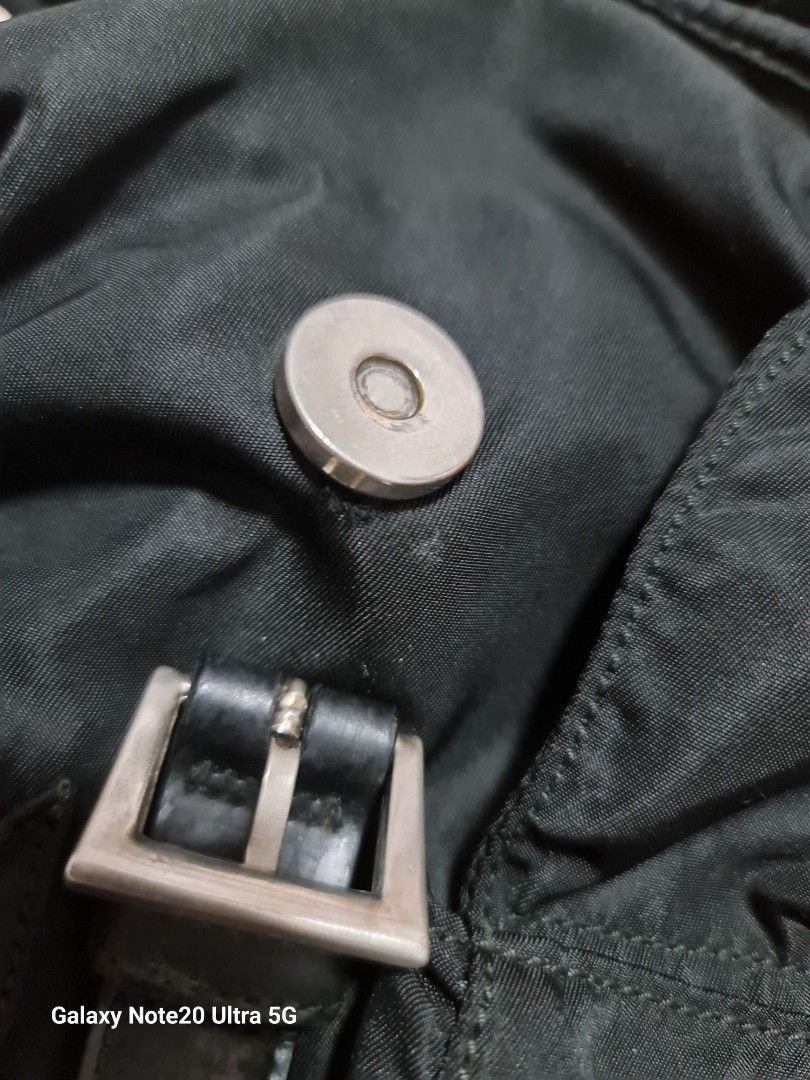 Heavily used Vintage Prada backpack (Category: Bags & Wallets) located in Singapore. Submitted by szane1 (Listing ID 1264918285, Image 9). Description: Authentic Vintage Prada Backpack, comes with bag alone. Take note the condition of this vintage piece- pics reflected as best as I could to show true condition..