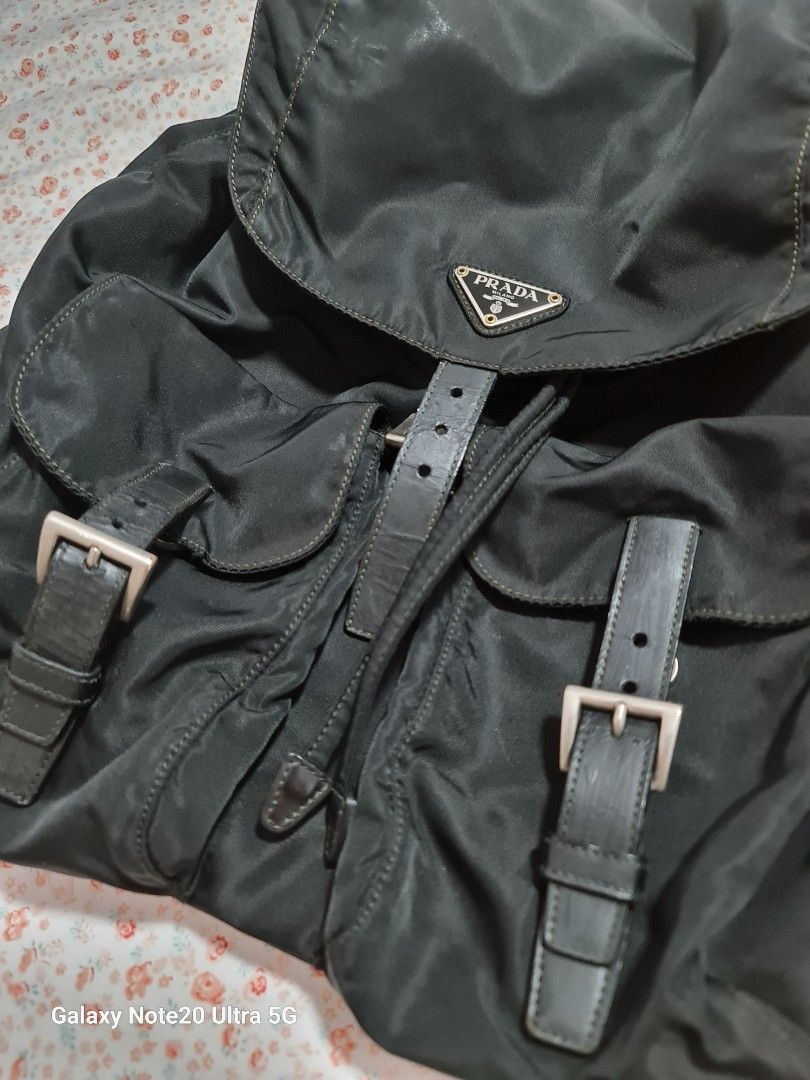 Heavily used Vintage Prada backpack (Category: Bags & Wallets) located in Singapore. Submitted by szane1 (Listing ID 1264918285, Image 2). Description: Authentic Vintage Prada Backpack, comes with bag alone. Take note the condition of this vintage piece- pics reflected as best as I could to show true condition..