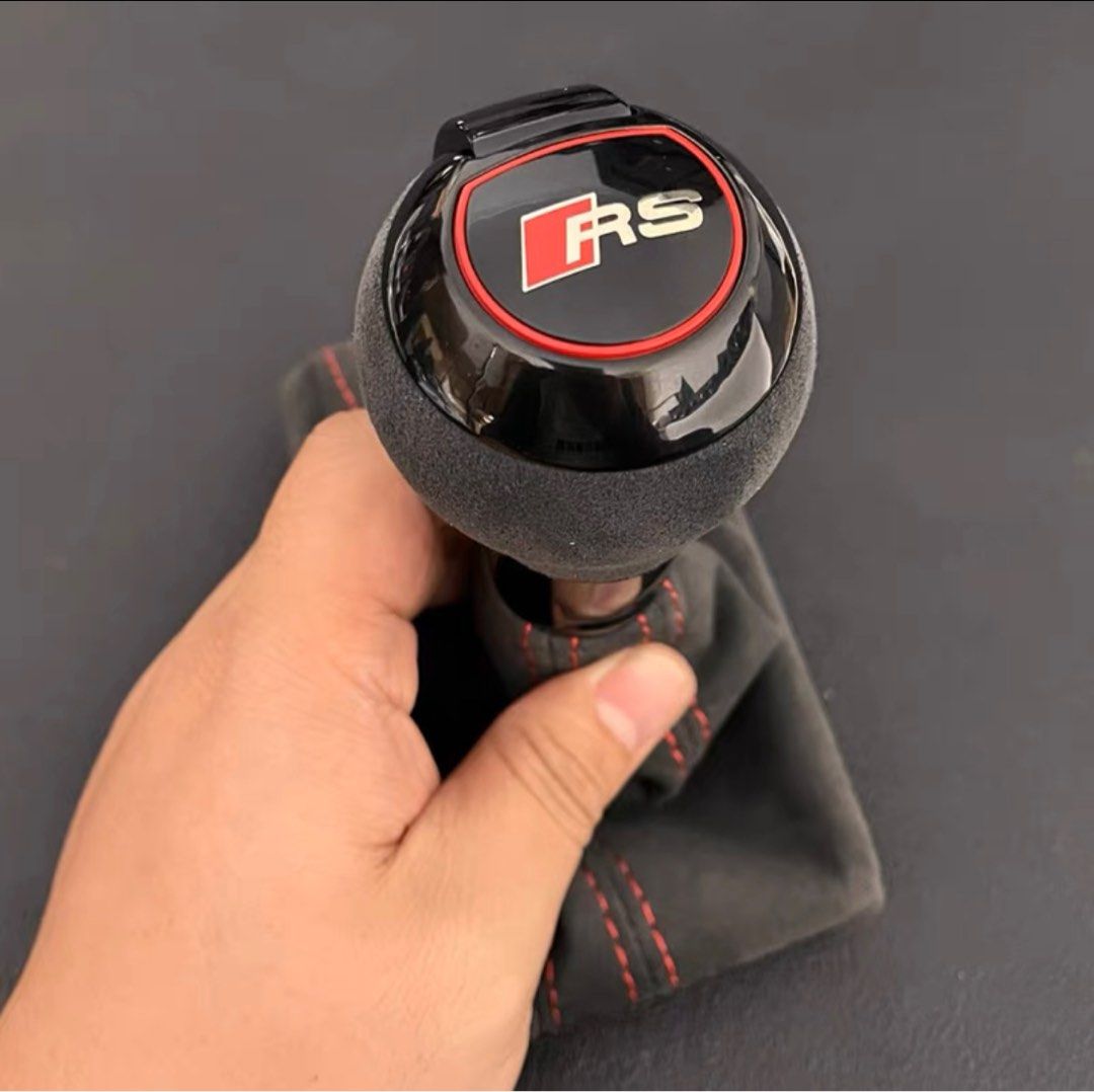 Audi Volkswagen VW Golf GTI R Jetta A3 A4 A5 A7 A8 Q2 Q3 Q5 Q7 S-tronic RS gear knob (Category: Interior Styling & Trim) located in Singapore. Submitted by car4life (Listing ID 1045729363, Image 3). Description: Leather $128; Carbon fibre & Alcantara : $158 Full black gear knob add $20. ⭐️ RS, Stronic, GTI, R logos. -Direct fit for front facing shift gear knob; -Side press button can be modified; -Leather boot bracket use back original one if rep