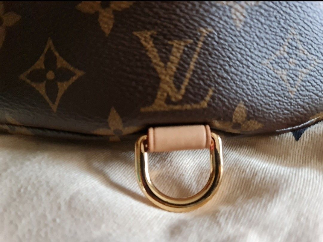 Almost BN Louis Vuitton Bum bag - discontinued (Category: Bags & Wallets) located in Singapore. Submitted by szane1 (Listing ID 1249991530, Image 5). Description: Almost Brand New LV Bum bag - discontinued. size is great, can fit more than essentials! Comes with full set - Box, Dust bag, receipt. meet up at Jurong or Town. Comes with organiser. Suitable for Both Men & Women..