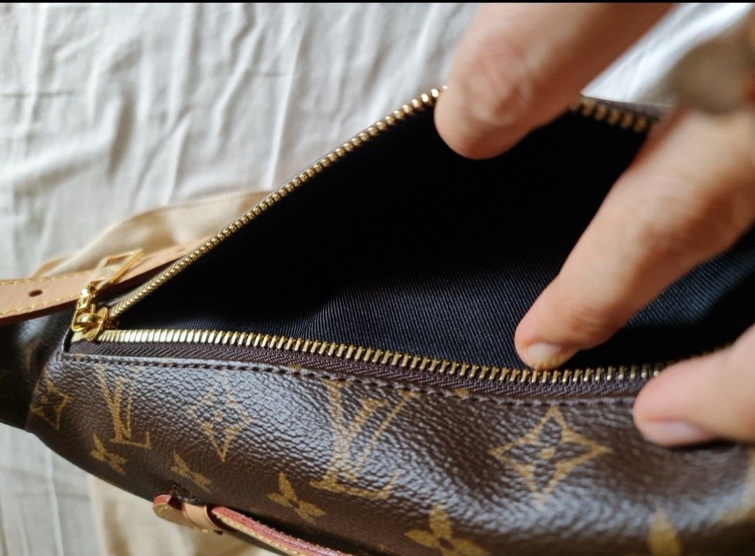 Almost BN Louis Vuitton Bum bag - discontinued (Category: Bags & Wallets) located in Singapore. Submitted by szane1 (Listing ID 1249991530, Image 4). Description: Almost Brand New LV Bum bag - discontinued. size is great, can fit more than essentials! Comes with full set - Box, Dust bag, receipt. meet up at Jurong or Town. Comes with organiser. Suitable for Both Men & Women..