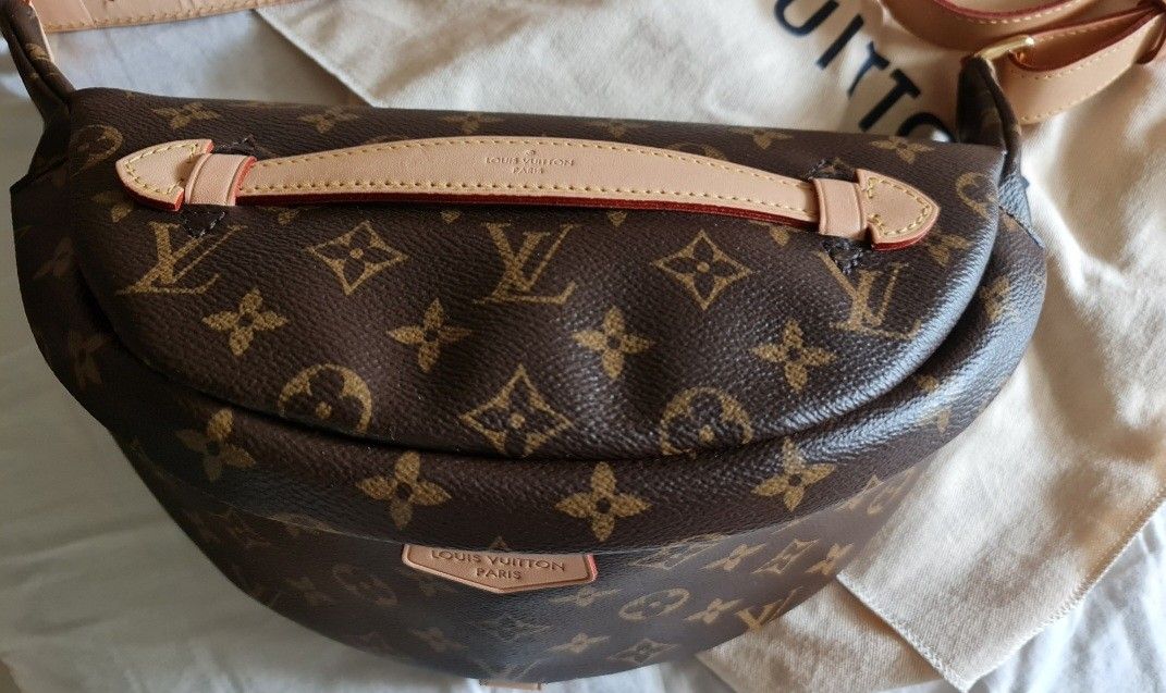 Almost BN Louis Vuitton Bum bag - discontinued (Category: Bags & Wallets) located in Singapore. Submitted by szane1 (Listing ID 1249991530, Image 2). Description: Almost Brand New LV Bum bag - discontinued. size is great, can fit more than essentials! Comes with full set - Box, Dust bag, receipt. meet up at Jurong or Town. Comes with organiser. Suitable for Both Men & Women..