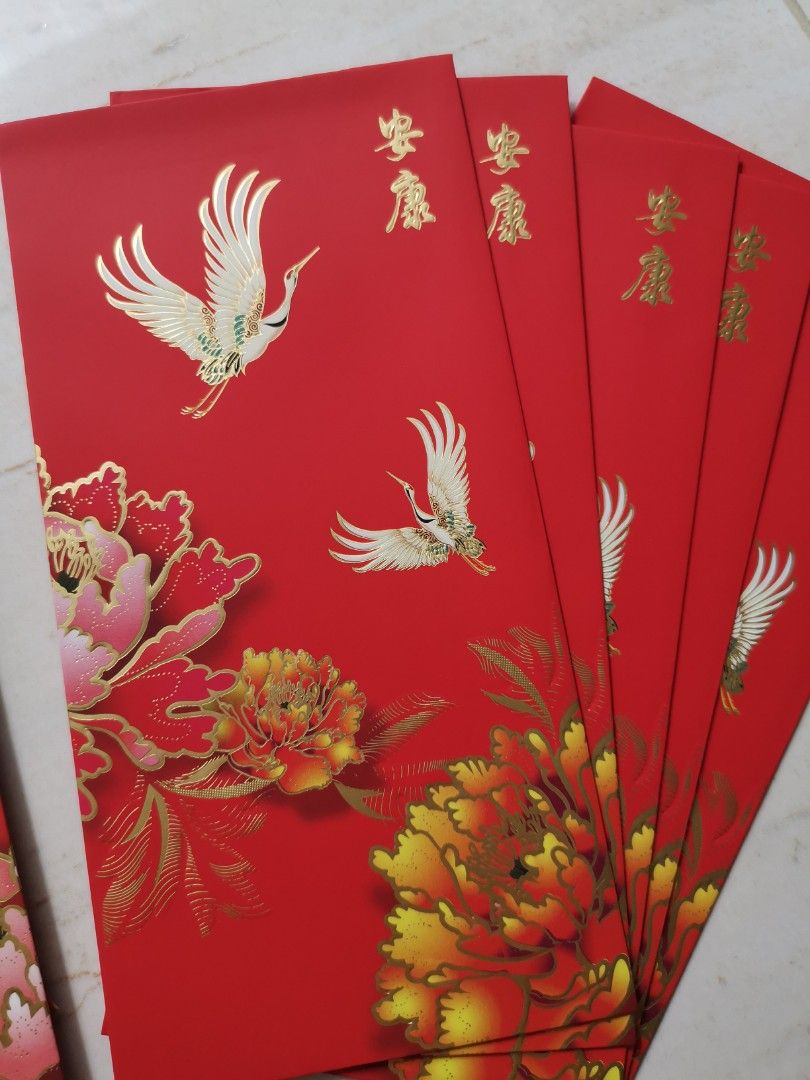 Collectible CNY Red Packets/Ang pow (Category: Occasions & Party Supplies) located in Singapore. Submitted by meowsshop (Listing ID 1282648847, Image 2). Description: Brand new 10 pieces in a pack, made of good quality material 5 pieces of each designs 2D printing surface 3 sets Check out my listing for more red packet / Ang pow designs #dragon #redpacket #angpow #angbao.