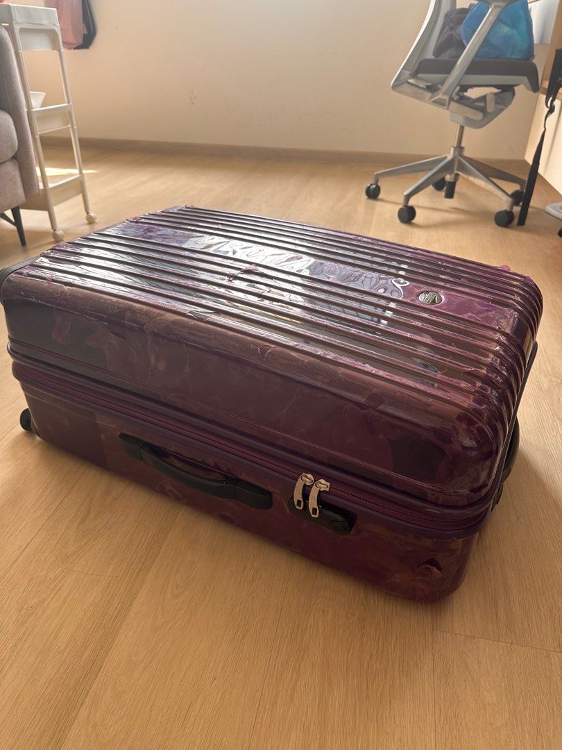 30” American tourister luggage (Category: Luggage) located in Singapore. Submitted by geeee_nette (Listing ID 1331655861, Image 3). Description: Heavily used as shown in pictures. The glossy layer is detaching from the case. Might look better if entirely peeled off (matte underneath). However, all fully functional and honestly other than the outer appearance it held up very well for me over the years despite carrying heavy stuff as an overpacker.