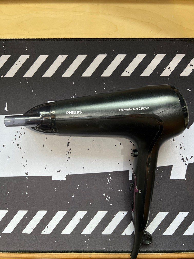Philips ThermoProtect 2100W Hairdryer (Category: Hair) located in Singapore. Submitted by thisisrhubarb (Listing ID 1331649775, Image 1). Description: Hairdryer. Used but in good condition .