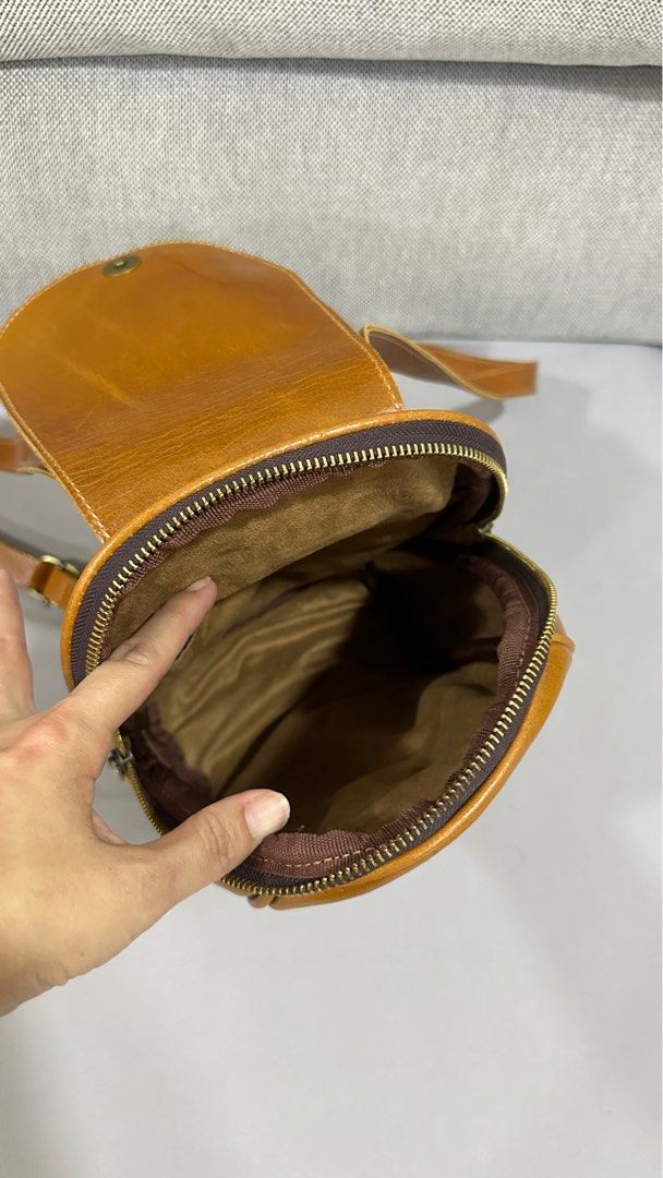 Leather Backpack (Category: Backpacks) located in Singapore. Submitted by sophiachong800 (Listing ID 1333394891, Image 4). Description: A genuine leather small Backpack for sale. Still in very good condition .