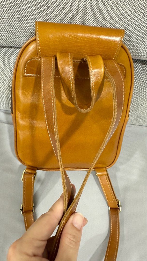 Leather Backpack (Category: Backpacks) located in Singapore. Submitted by sophiachong800 (Listing ID 1333394891, Image 6). Description: A genuine leather small Backpack for sale. Still in very good condition .