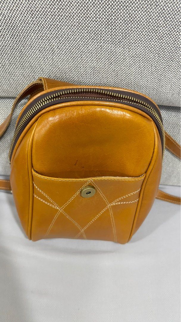 Leather Backpack (Category: Backpacks) located in Singapore. Submitted by sophiachong800 (Listing ID 1333394891, Image 2). Description: A genuine leather small Backpack for sale. Still in very good condition .