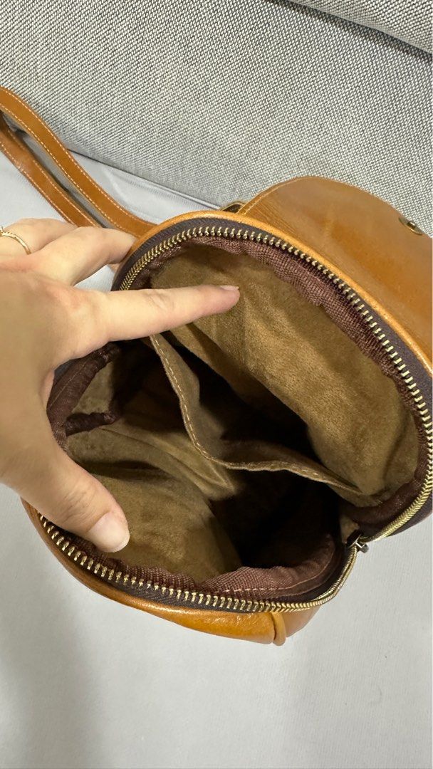 Leather Backpack (Category: Backpacks) located in Singapore. Submitted by sophiachong800 (Listing ID 1333394891, Image 3). Description: A genuine leather small Backpack for sale. Still in very good condition .