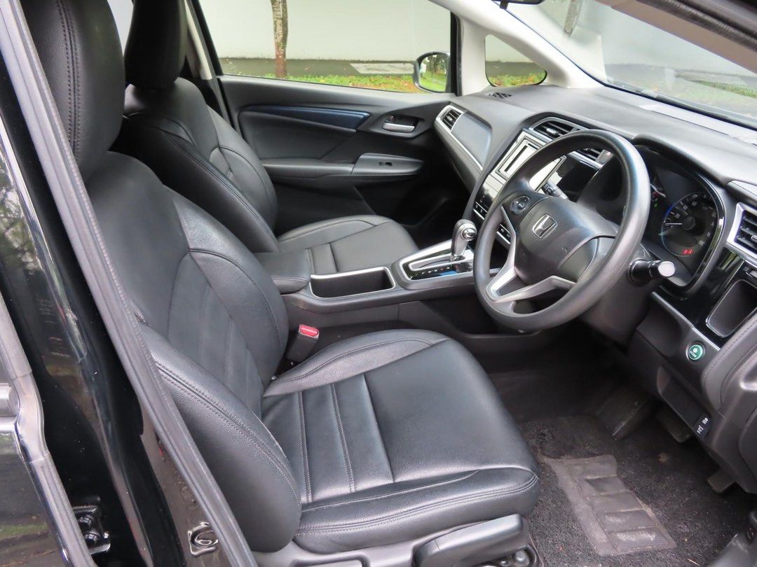 Honda shuttle 1.5A G / Grab / Gojek/ Ryde /TADA / PHV READY (Category: Car Rental) located in Singapore. Submitted by 98leasingventures (Listing ID 1338682026, Image 4). Description: FUEL EFFICIENT!! WELL MAINTAINED - 14-17km/L PHV GRAB / GOJEK / TADA / RYDE Available for personal usage / PHV (Gojek/ Grab / Ryde) NO EXTRA COST FOR PHV/DELIVERY NETT PRICE Min 22 years old 2 Years driving Exp Fuel efficient cost effective and economical and in grea