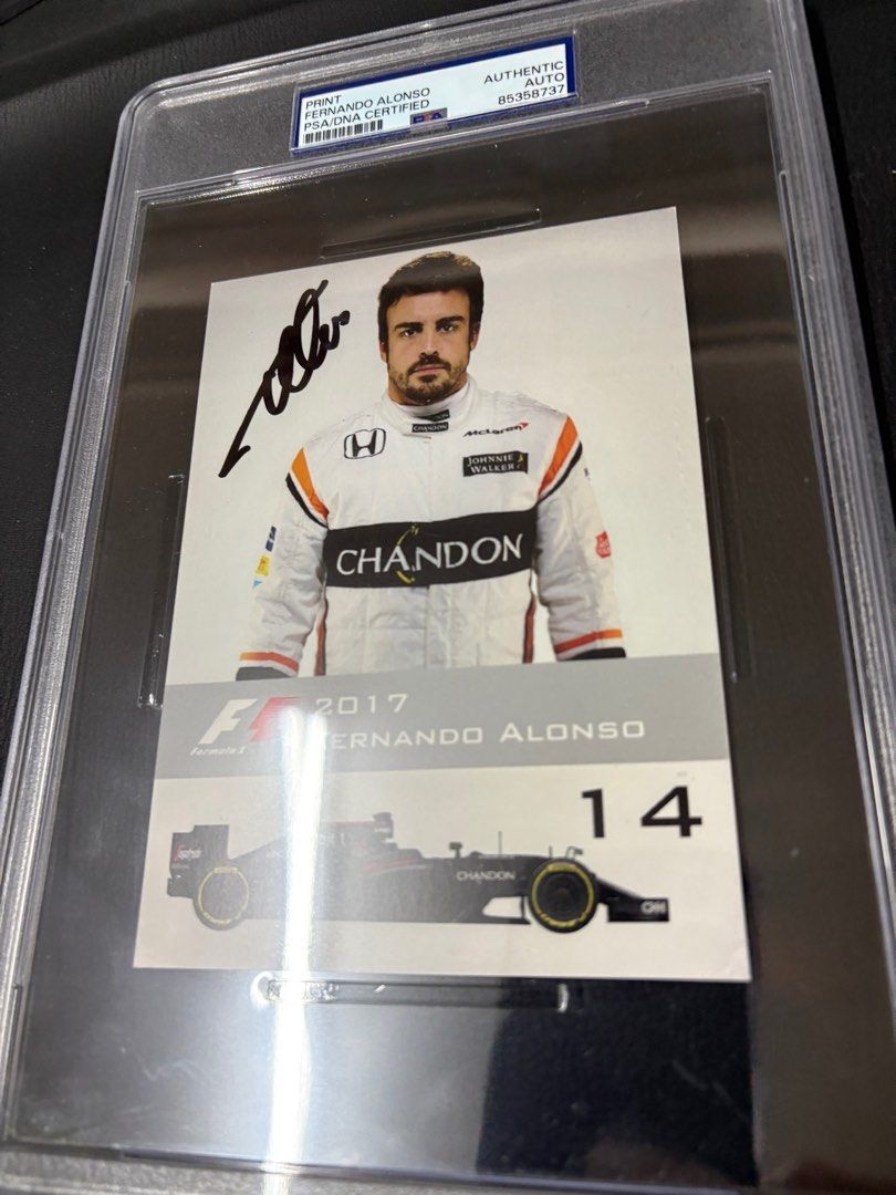 F1 Fernando Alonso PSA certified signed autograph encased postcard (Category: Other Merchandise) located in Singapore. Submitted by mancave_memorabilia (Listing ID 1340957026, Image 1). Description: Other snapshot refers for Alonso signed item. Signed jersey is at more than 1000 sgd. .