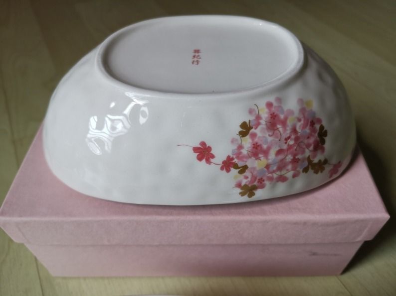 Authentic Japanese Porcelain Bowls with Decorative Pink Sakura Design (Category: Vases & Decorative Bowls) located in Singapore. Submitted by ronnielee1 (Listing ID 1340685001, Image 3). Description: original made in Japan, authentic porcelain bowls (2 pcs in a set) with decorative sakura design. not used at all, comes in original box, selling the set for $10. Cash or Paynow 97430067. Self collect at Kallang MRT or Blk 3A Kallang Heights 381003..