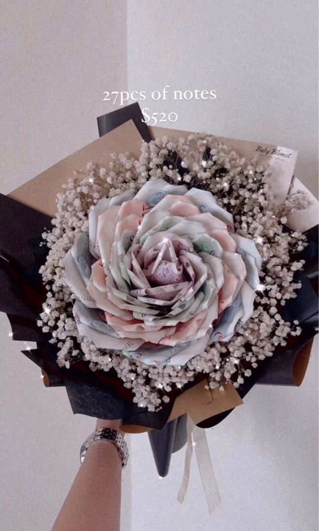 Camellia money bouquet/ Birthday bouquet/ Valentine’s Day bouquet / Mother’s Day bouquet (Category: Flowers & Bouquets) located in Singapore. Submitted by babyblomst (Listing ID 1145913641, Image 3). Description: Customisable Money Bouquet -Charges depends on the number of pieces 🌷Flower colour: Pink, blue, purple, red, yellow , orange, white 🌷Wrapper: Pink, purple, blue, yellow, orange, red, white, Black and gold 🌷Add on (optional): +$5 Fairy