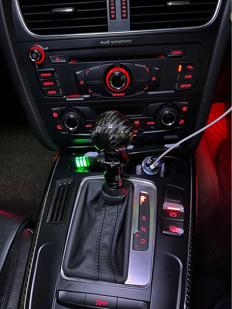 Audi Volkswagen VW Golf GTI R Jetta A3 A4 A5 A7 A8 Q2 Q3 Q5 Q7 S-tronic RS gear knob (Category: Interior Styling & Trim) located in Singapore. Submitted by car4life (Listing ID 1045729363, Image 9). Description: Leather $128; Carbon fibre & Alcantara : $158 Full black gear knob add $20. ⭐️ RS, Stronic, GTI, R logos. -Direct fit for front facing shift gear knob; -Side press button can be modified; -Leather boot bracket use back original one if rep