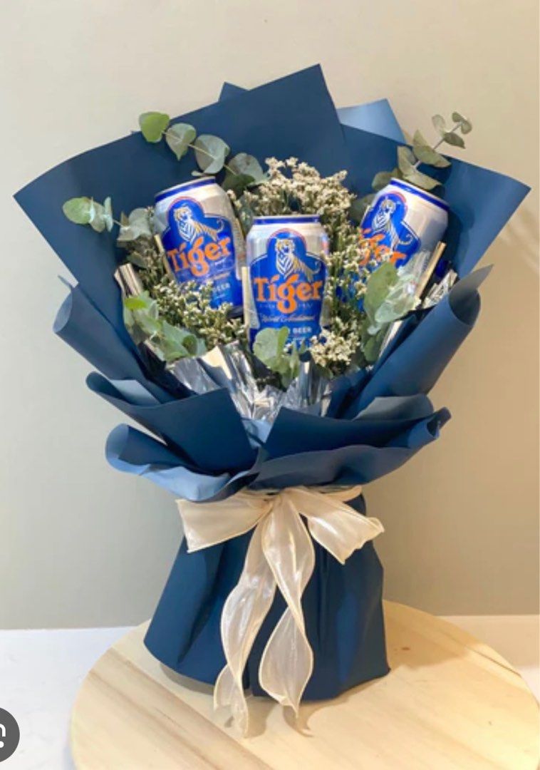 FATHER’S DAY Tiger Beer Bouquet Valentines Vday Valentine Father’s Day| Kronenbourg Blanc Guinness Heineken Asahi Hite Carlsberg Anchor Corona | Flowers Money Chips Nuts Chocolate Snack | Cheap Husband Birthday Anniversary Graduation Boyfriend Dad (Category: Flowers & Bouquets) located in Singapore. Submitted by thehobbitgarden (Listing ID 1308311274, Image 4). Description: 1 can of beer mini bouquet - $48 3 cans of beer medium bouquet - $98 5 ca