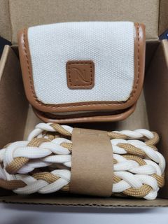Nespresso earbuds case with strap