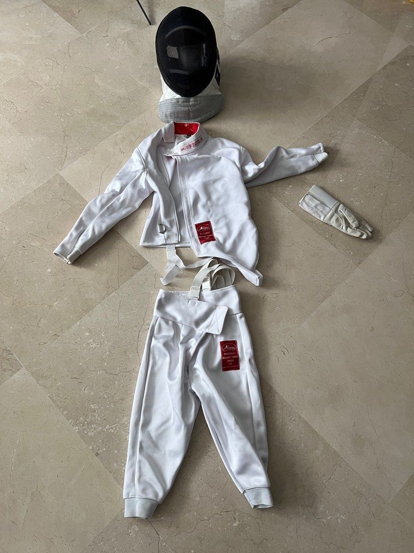 Fencing costume with helmet for kids, left hand (Category: Other Sports Equipment and Supplies) located in Singapore. Submitted by papayazzi (Listing ID 1314400607, Image 1). Description: Like new, was worn less than 5 times. The full set was $225. For kids not taller than 120cm..