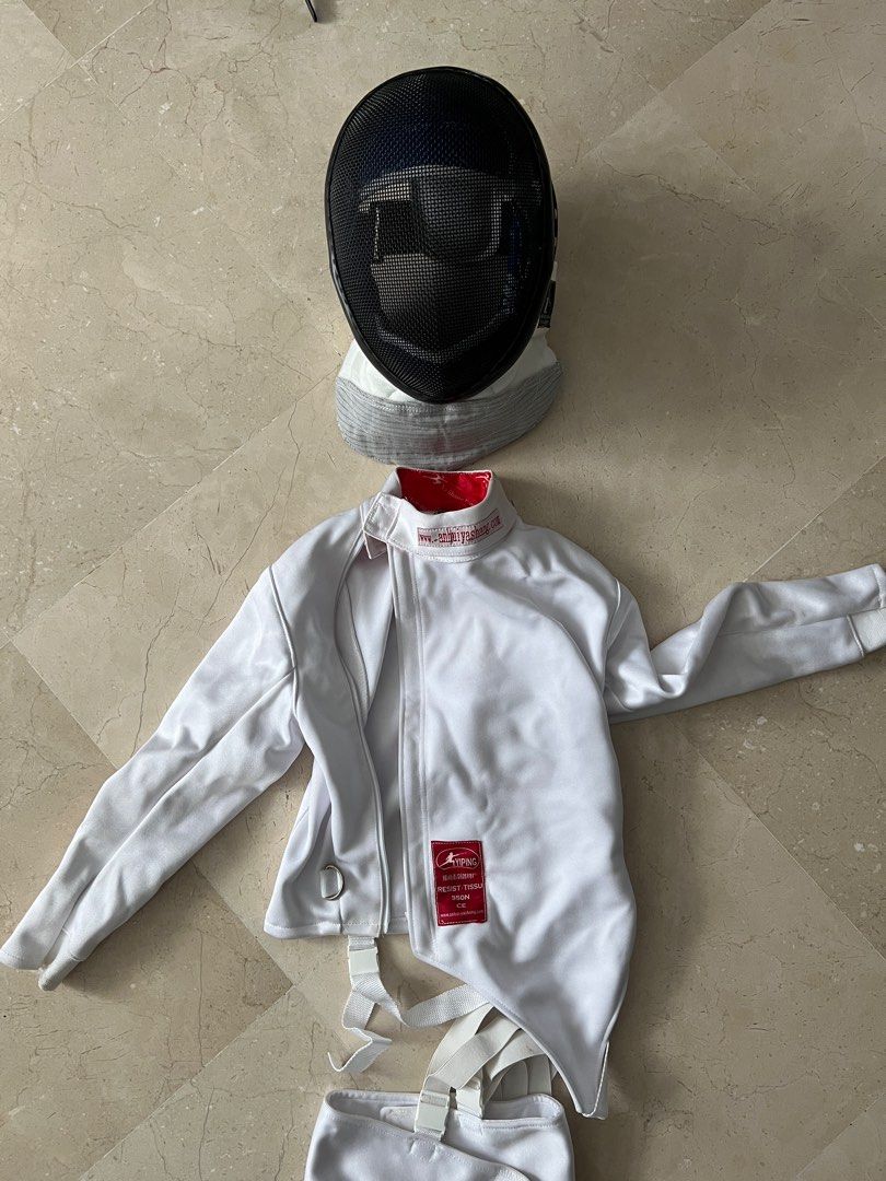 Fencing costume with helmet for kids, left hand (Category: Other Sports Equipment and Supplies) located in Singapore. Submitted by papayazzi (Listing ID 1314400607, Image 2). Description: Like new, was worn less than 5 times. The full set was $225. For kids not taller than 120cm..