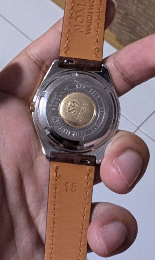 Grand Seiko 5645-7010 Hi-Beat Gold (Category: Men's Watches) located in Singapore. Submitted by steveaaa (Listing ID 1312490631, Image 2). Description: Grand Seiko 5645-7010 for sale. Bought it from Chrono 24 from a Japanese dealer. in pretty good condition considering it's age. small dents and scratches around. date wheel is disconnected..