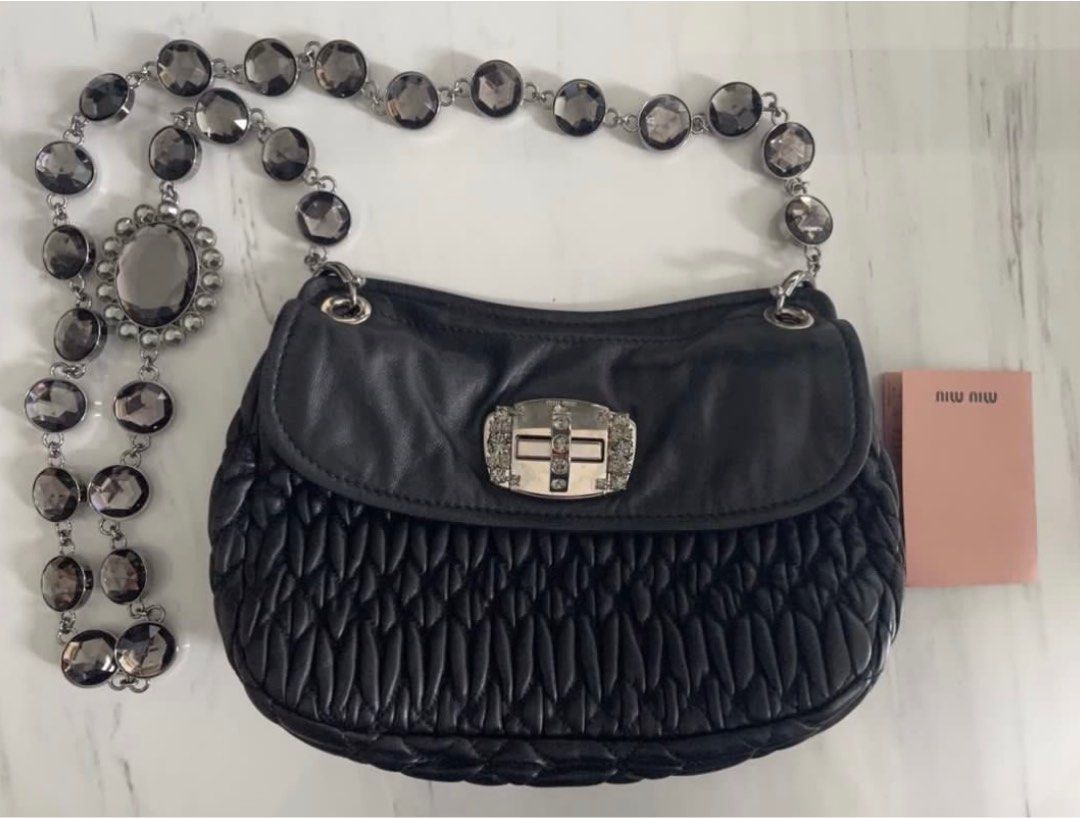 Miu Miu Ladies Sling Bag (Category: Bags & Wallets) located in Singapore. Submitted by angaloysius (Listing ID 1312662066, Image 2). Description: Dimensions - 25 cm x 15 cm.