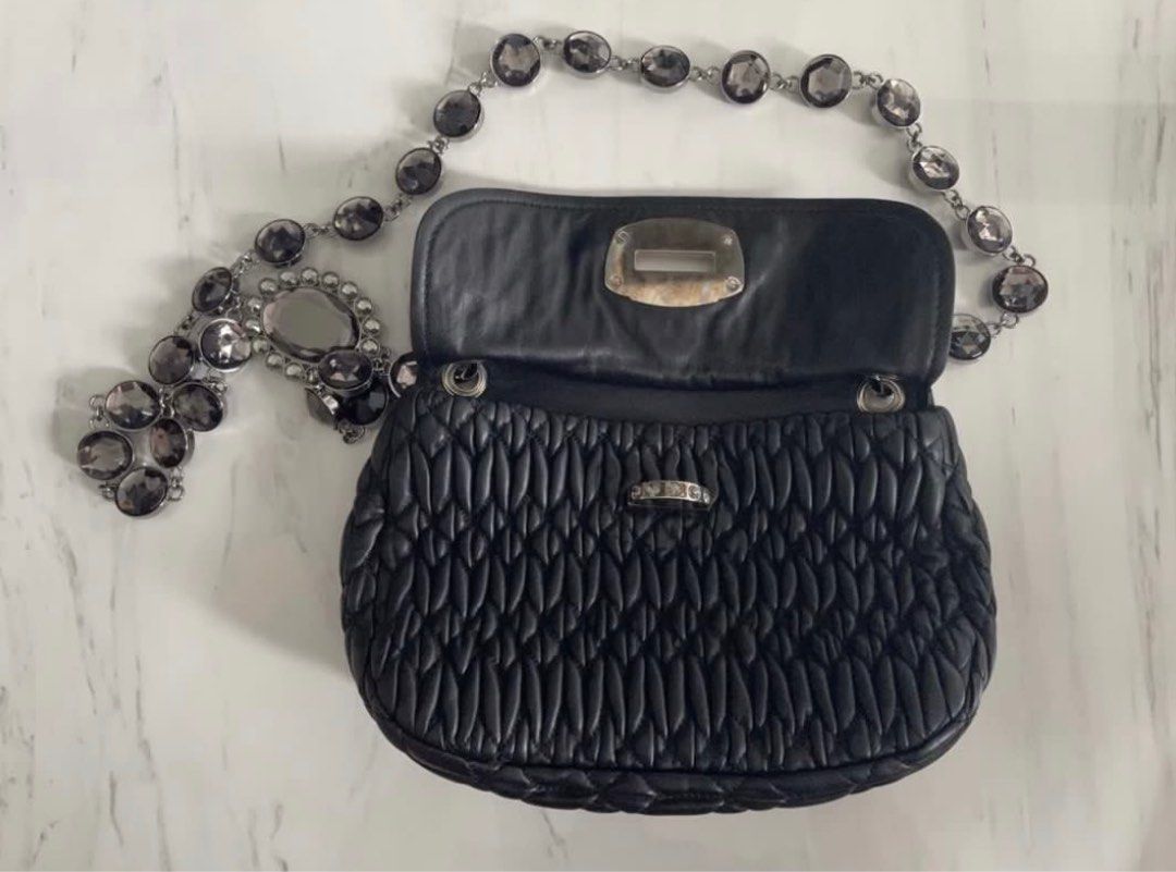 Miu Miu Ladies Sling Bag (Category: Bags & Wallets) located in Singapore. Submitted by angaloysius (Listing ID 1312662066, Image 1). Description: Dimensions - 25 cm x 15 cm.
