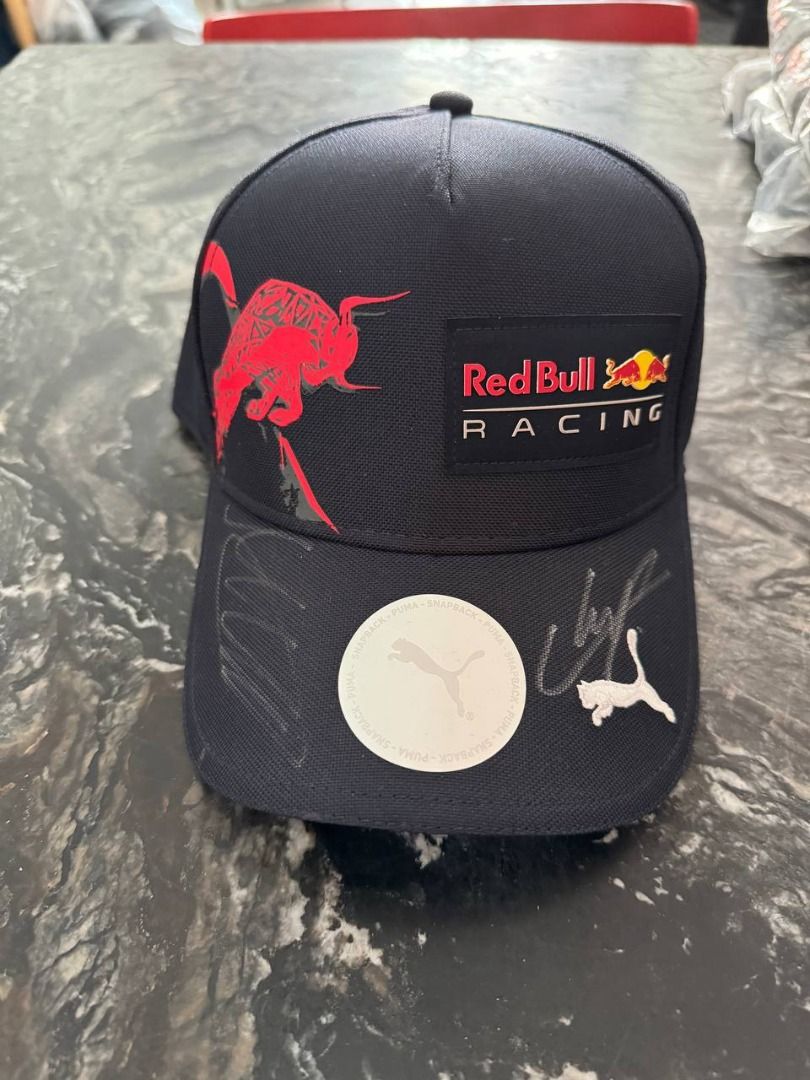 Red Bull Racing Collection: 2024 Team Polo, Max Verstappen 2023 Mini Helmet, & Signed Cap (Category: Other Merchandise) located in Singapore. Submitted by the.g.store (Listing ID 1322781735, Image 1). Description: Red Bull 2024 Team Polo Blue (Castore) Size L: $88 Elevate your racing style with the official Red Bull 2024 Team Polo by Castore. This high-quality, blue polo features the iconic Red Bull Racing logo, offering both comfort and a sleek 