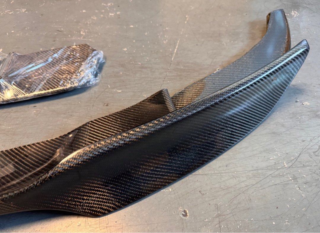 Vorsteiner Carbon Fiber Front Lip for BMW F10 M5 (Category: Bodykits & Styling) located in Singapore. Submitted by heckcare (Listing ID 1326644485, Image 6). Description: Up for sale is a brand new Vorsteiner Carbon Fiber Front Lip, originally purchased for my BMW F10 535i, but unfortunately, it doesn’t fit my car. This lip is specifically designed for the BMW F10 M5 with its wider front bumper and unique design. • Condition: Brand new • Fitment: