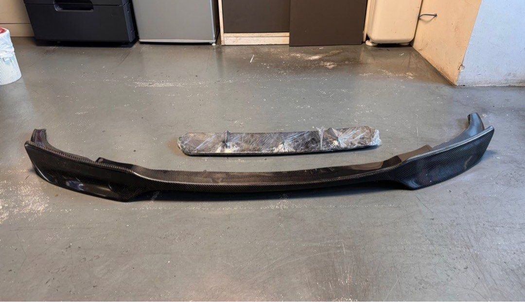 Vorsteiner Carbon Fiber Front Lip for BMW F10 M5 (Category: Bodykits & Styling) located in Singapore. Submitted by heckcare (Listing ID 1326644485, Image 3). Description: Up for sale is a brand new Vorsteiner Carbon Fiber Front Lip, originally purchased for my BMW F10 535i, but unfortunately, it doesn’t fit my car. This lip is specifically designed for the BMW F10 M5 with its wider front bumper and unique design. • Condition: Brand new • Fitment: