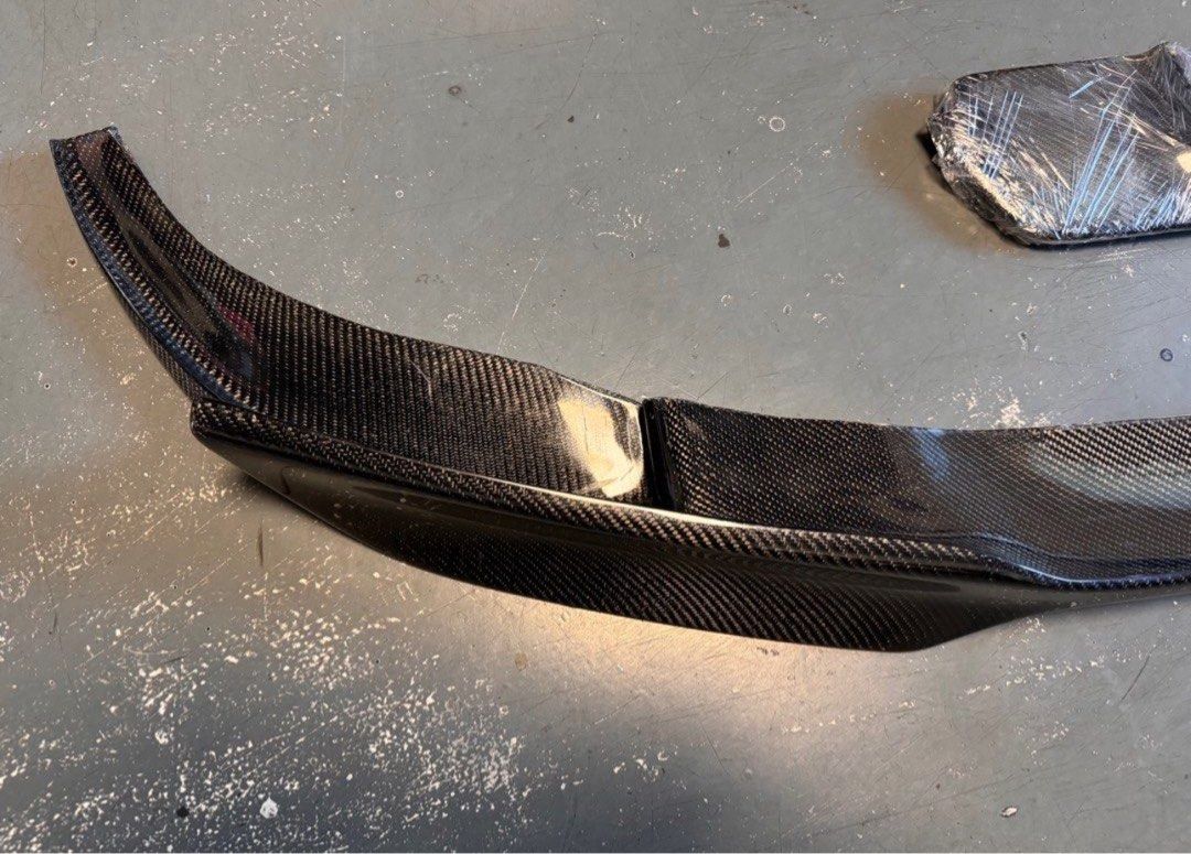 Vorsteiner Carbon Fiber Front Lip for BMW F10 M5 (Category: Bodykits & Styling) located in Singapore. Submitted by heckcare (Listing ID 1326644485, Image 4). Description: Up for sale is a brand new Vorsteiner Carbon Fiber Front Lip, originally purchased for my BMW F10 535i, but unfortunately, it doesn’t fit my car. This lip is specifically designed for the BMW F10 M5 with its wider front bumper and unique design. • Condition: Brand new • Fitment: