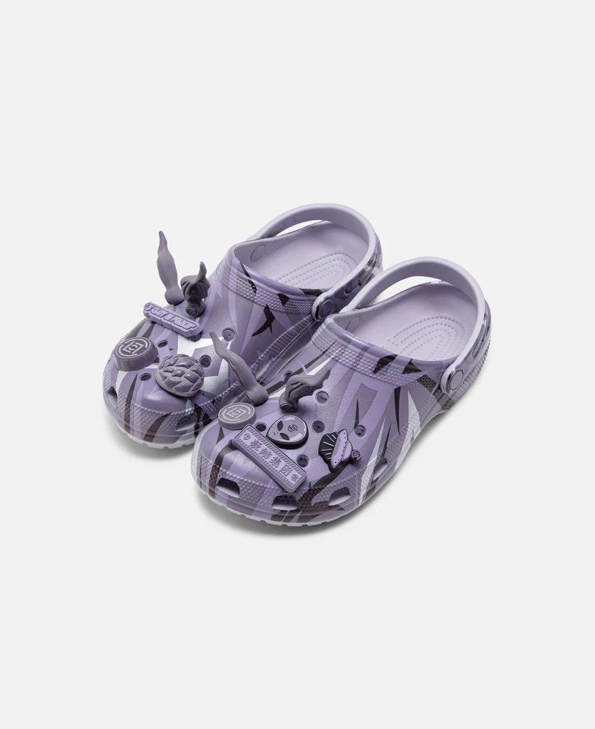 Clot x Crocs (Black & Purple) (Category: Sneakers) located in Singapore. Submitted by hypeprn (Listing ID 1327971147, Image 3). Description: US 9 / UK 8 / 27 cm / EU 42.5-43 Foam Construction All-Over Printed Graphic Croslite™ Footbed Iconic Crocs Comfort™ Branded Heel Strap Mauve Mist Colorway .