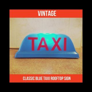 Vintage classic blue taxi rooftop sign